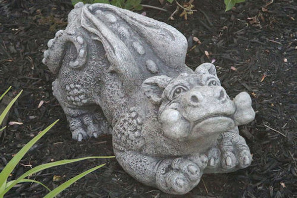 Biscuit the Little Dragon Cement Statue Bone Playful Pet sculptures